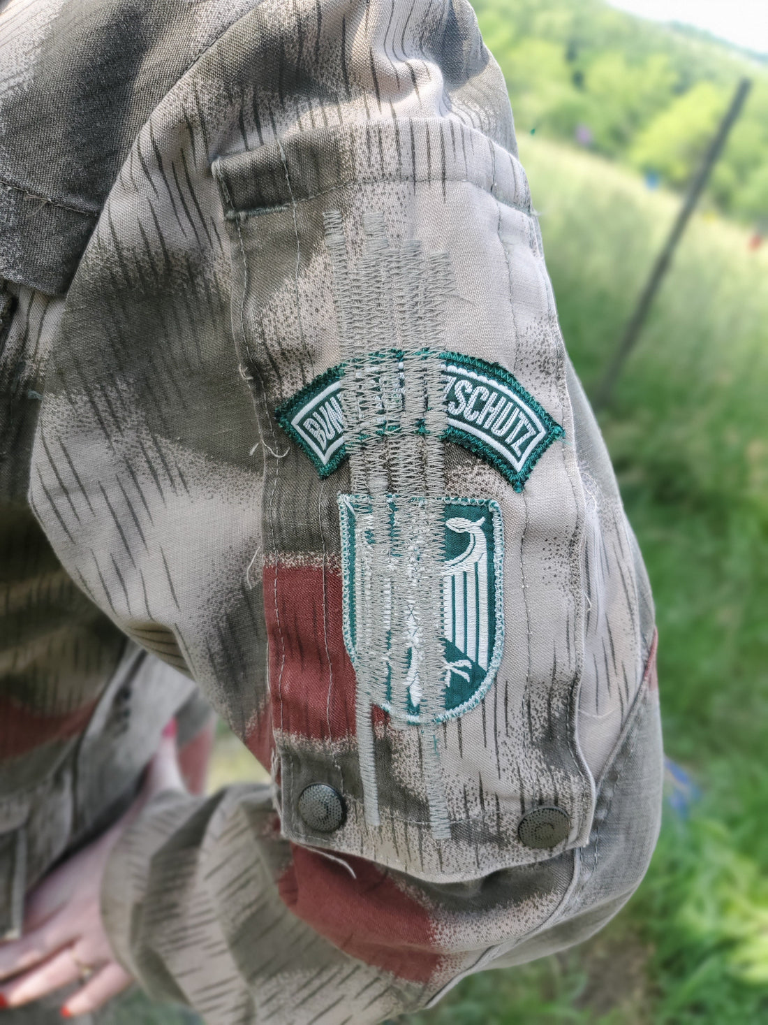 Why German BGS camo parkas and jacket have demili cut?